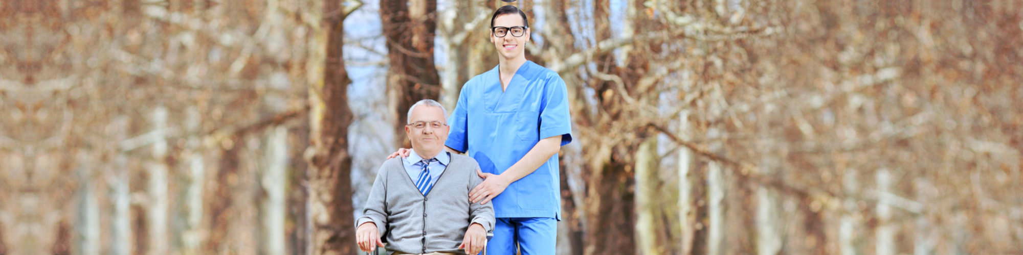 male nurse and senior man are smiling